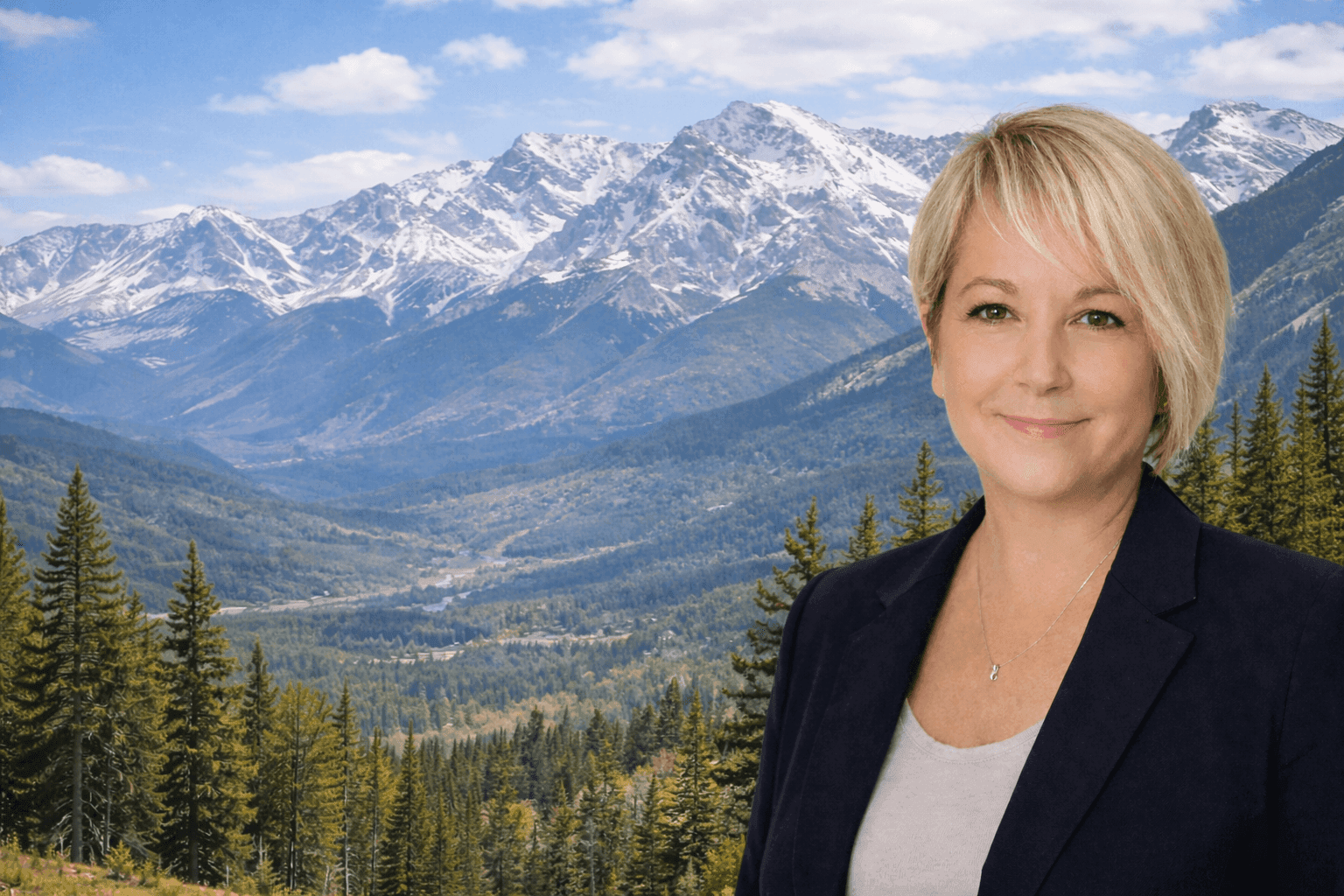 Robin standing in front of a mountain landscape